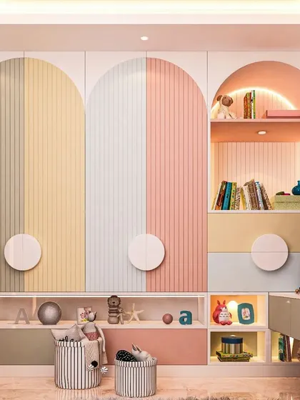 This colorful storage unit for a kids' room uses a pastel palette of pink, yellow, and grey. The design includes arched wardrobe doors, open shelving, and low drawers, making it easy for children to access their belongings.