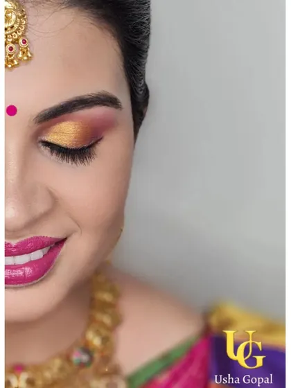 A close-up of the colorful eye makeup for a naming ceremony. In my classes, we break down how to blend multiple eyeshadow shades for a professional finish.