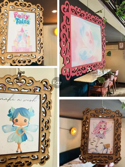A collage of the beautiful hanging frames used in the enchanted garden party, each featuring a different fairy or magical illustration.