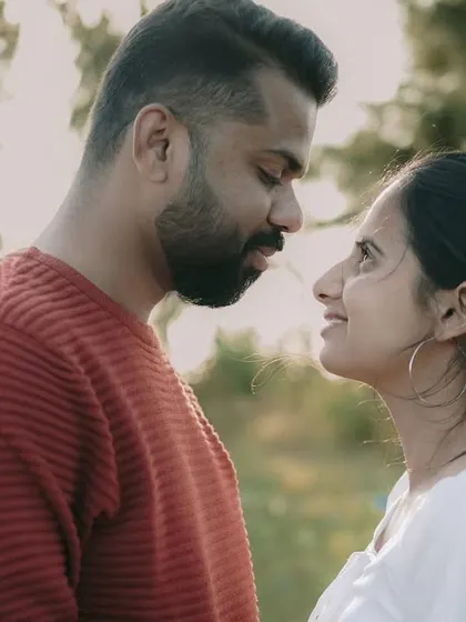 A simple and sweet close-up of the couple, focusing on their loving expressions.