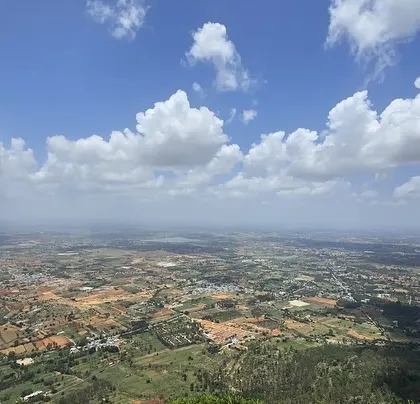 The stunning aerial view from Nandi Hills, which we often combine with our Adiyogi trips for a full day of sightseeing.