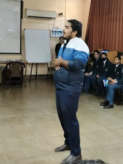 An instructor addresses the class at the start of a workshop, setting the stage for a day of learning and innovation.