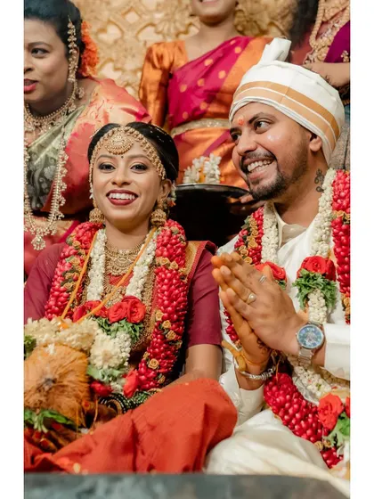 A candid, happy portrait of the couple during their wedding ceremony.
