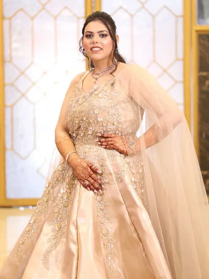 A confident and poised full-length shot of the bride, ready for her engagement party.