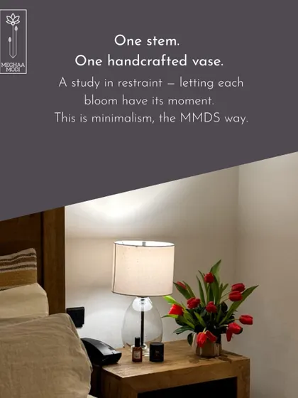 A study in restraint. This minimalist arrangement of red tulips in a simple vase shows that sometimes, less is more. This is minimalism, the MMDS way.