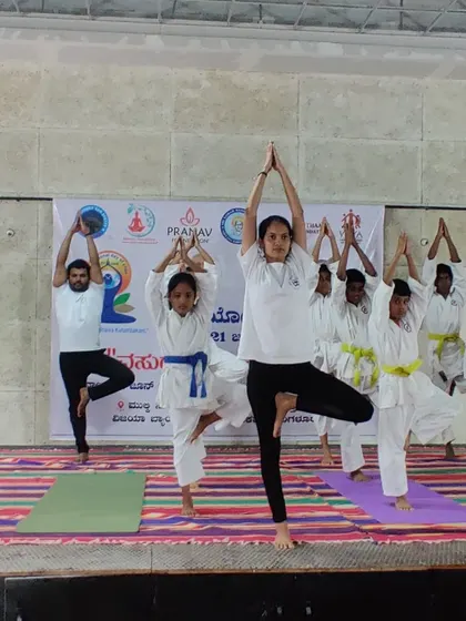Our students participating in a yoga session for International Day of Yoga. We believe in holistic fitness, and yoga is excellent for improving flexibility and focus for martial arts.