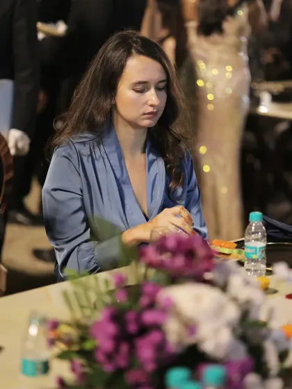 A guest enjoying the ambiance of the evening. Our goal is to create a complete experience where the food, service, and atmosphere all contribute to a memorable celebration.