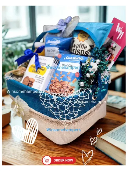 This munching hamper is styled beautifully on a desk, showing it's the perfect companion for a work-from-home treat or an office snack break.