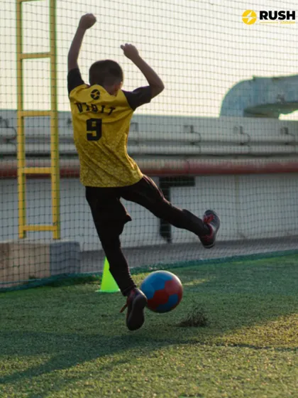 A player celebrates after scoring a goal in practice.