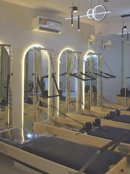 Welcome to our modern, well-lit Pilates studio in Janakpuri. We've created a clean, welcoming, and motivating environment with top-of-the-line Reformer machines so you can focus on your fitness journey.