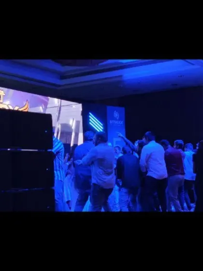 A side view of the stage and sound system at the Bitsilica corporate event.