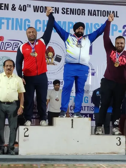 On the podium receiving the overall silver medal at the 48th Senior National Equipped Powerlifting Championship. Always fighting for the top spot.