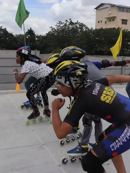Skaters in position at the starting line of a race, demonstrating the focus and determination we instill in our athletes.