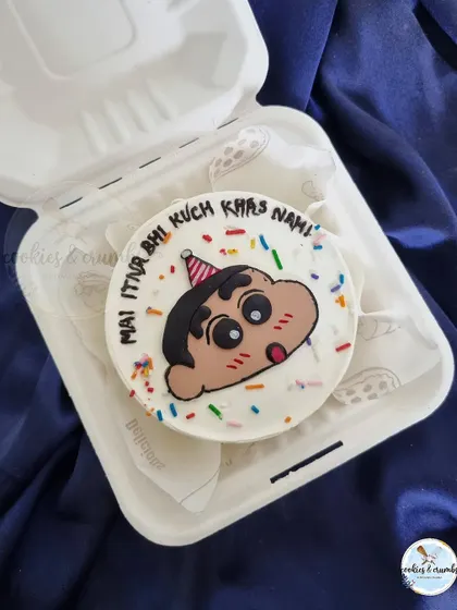 A cheeky Shinchan bento cake with one of his famous lines. This is a great example of how I can add fun, custom text to my cakes.