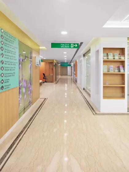 The interiors of Max Super Speciality Hospital use an earthy palette of whites, beiges, and browns. This color strategy, based on environmental psychology, is chosen specifically to stimulate healing and create a calm, restorative visual environment.