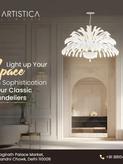 This classic white chandelier features a unique, feather-like design. It brings a touch of softness and sophistication to a room, perfect for a classic entryway or a serene bedroom setting.