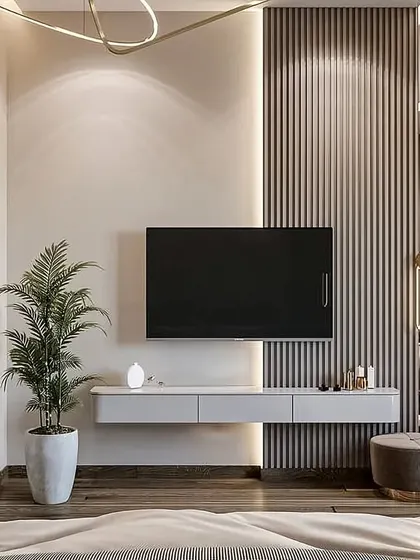 A minimalist bedroom TV unit with a floating console against a fluted panel wall, keeping the space uncluttered and serene.