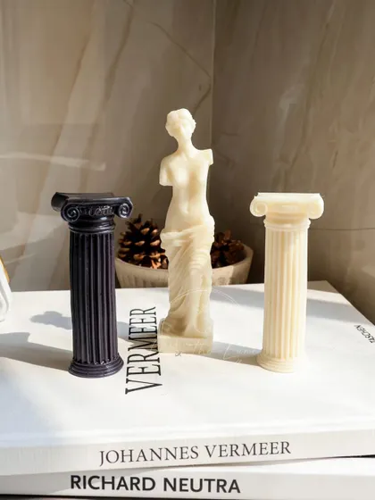 A minimalist arrangement of my Venus and pillar candles. The black and white theme gives a modern twist to these classical forms.