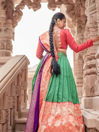 A duplicate of image 74, showing the back of the Langa Dhavani with its unique blouse design.
