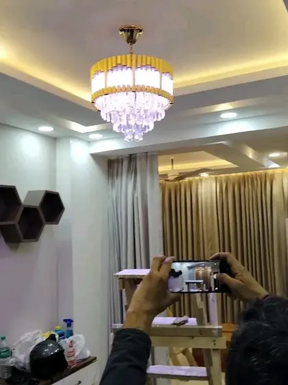A behind-the-scenes shot of me capturing the final photos of a completed project.