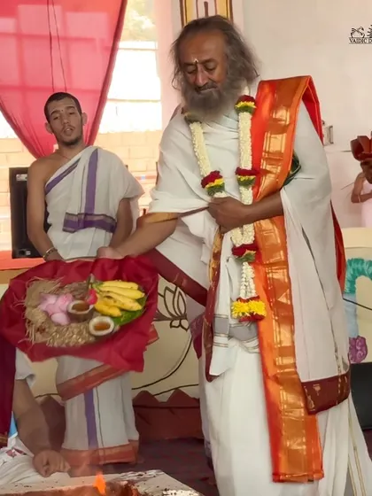 I am making an offering during the Rama Tarak Homa, a fire ceremony to honor Lord Rama. These rituals are a powerful way to connect with the divine and manifest positive intentions.