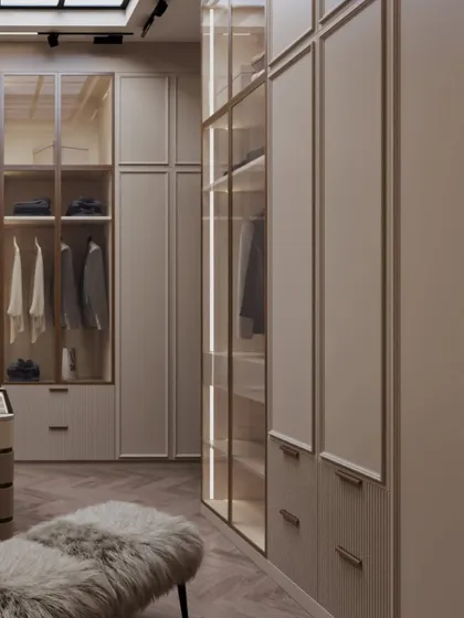 The design achieves a perfect balance of masculine structure and feminine softness, creating a neutral, timeless, and tailored space for everyday indulgence.