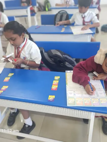 Students in our modern classroom work on a sorting and matching activity, which helps reinforce concepts and improves long-term knowledge retention.