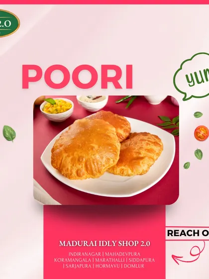 Our pooris are always puffed up and golden. This image captures their perfect texture, a delightful treat that is loved by kids and adults alike.