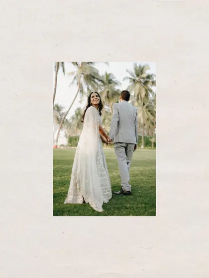 A happy moment from their engagement shoot in a beautiful garden setting by the coast. Her joyful look back says it all.