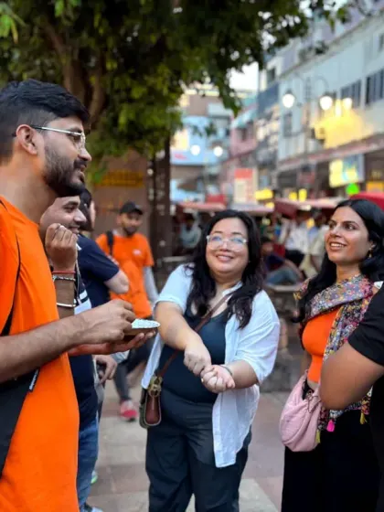 This is where food and stories come together. Our guide shares tales of Chandni Chowk with a group of explorers, proving that a shared meal is the best way to connect with a city's culture and its people.