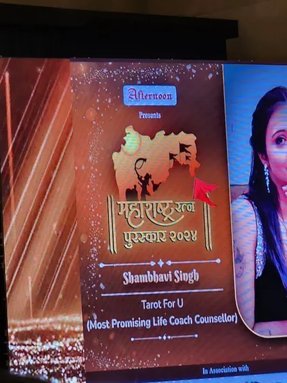 My name and title, "Most Promising Life Coach Counsellor," displayed on the big screen at the Maharashtra Ratan Puraskar 2024 event.