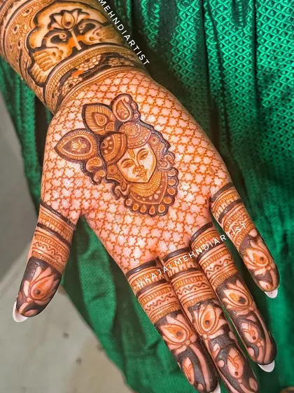 A closer look at the Shreenathji portrait, showing the fine details in his features and jewelry. Creating these divine figures is a form of meditation for me.