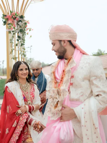 The couple sharing a meaningful look during their wedding ceremony.