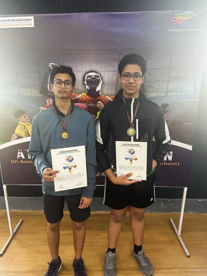 Two of our players with their bronze medals and certificates after a tough competition. Every tournament is a valuable learning experience.