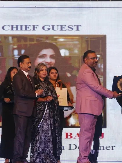 The chief guest is presented with a plaque in recognition of her presence and support.