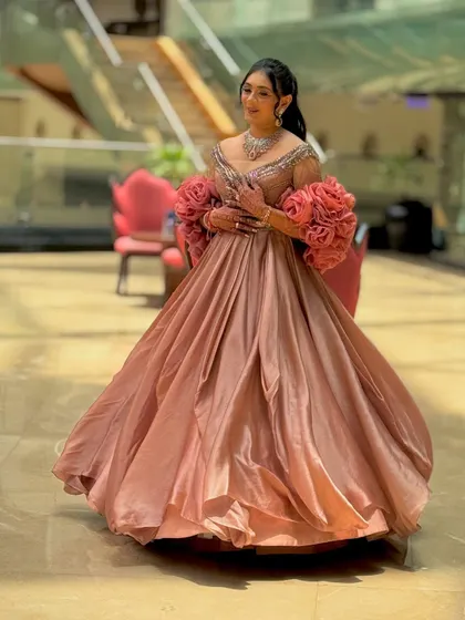 Another full-length shot showing the flow and movement of the beautiful gown.