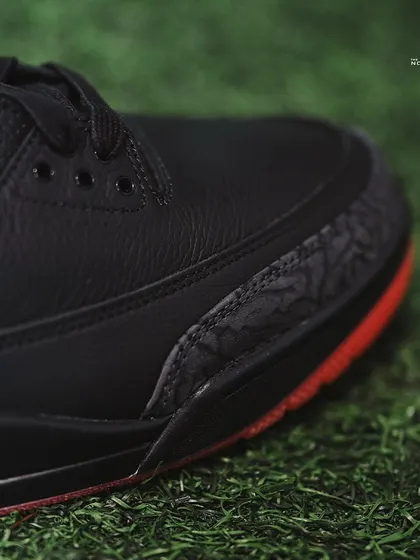 A macro shot of the classic elephant print overlay on the toe of the Jordan 3 J Balvin 'Rio'.