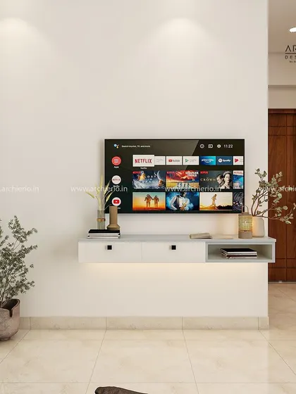 A modern and minimal TV unit design for a bedroom. The floating console keeps the space feeling light and uncluttered, perfect for a relaxing environment.