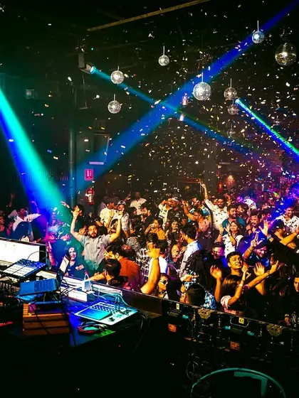 The vibe at Chayageet Night at MH04 The Drunkyard. The dance floor was packed with people enjoying the classic melodies and indie pop hits under a shower of confetti.