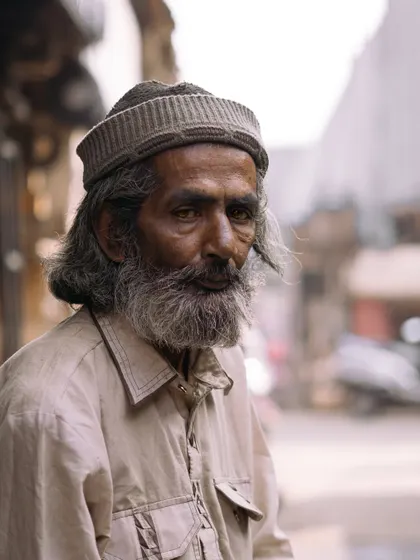 A poignant portrait of an old man with weathered features. This image, one of my favorites, represents my goal to find and share the stories etched in people's faces.