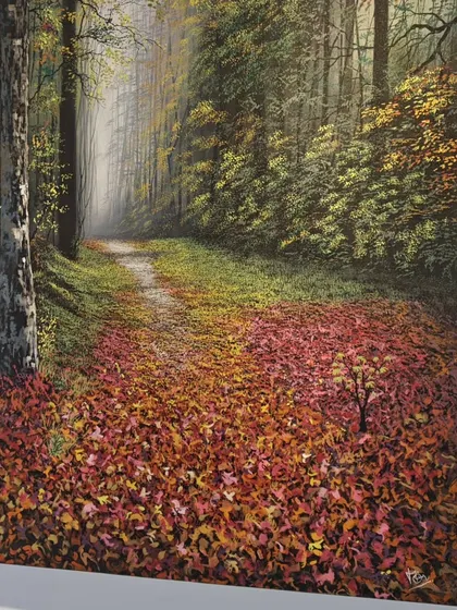 This painting of a path covered in red autumn leaves leads the viewer into a misty forest. It's a beautiful and immersive piece that captures the feeling of an autumn walk.