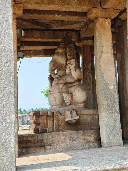 A side view of the Sasivekalu Ganapathi, highlighting the intricate carving from a single rock.