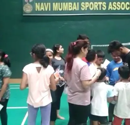 Another angle of me engaging with the young squad. These moments of encouragement are just as important as the on-court drills.