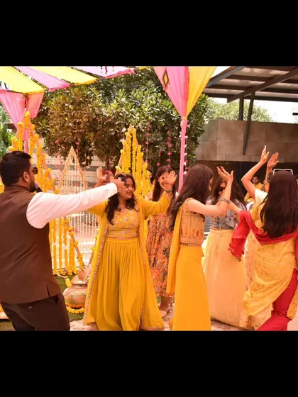 Leading a dance session with the ladies at a Haldi ceremony.