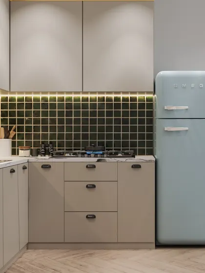A close-up on the cooking hob and cabinets, highlighting the material finishes and the warm glow of the under-cabinet LED lighting.