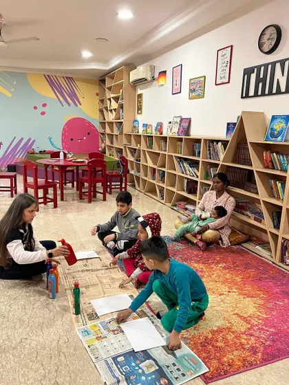 A glimpse of our winter camp setup, with children engaged in floor activities in our warm and colorful space.