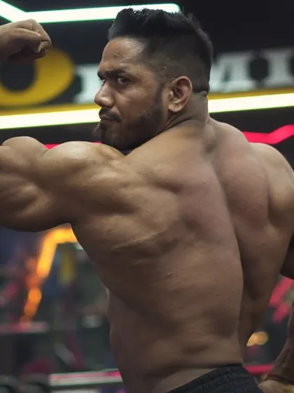 A back double bicep pose. The only shortcut is consistent hard work.