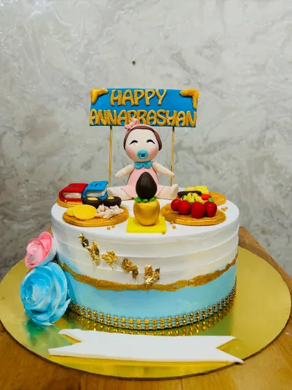 Another beautiful Annaprashan cake, this one for a baby girl, featuring all the traditional elements for the ceremony.