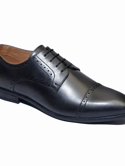 A perfect, clean shot of a formal leather shoe, isolated on a white background. This is the gold standard for e-commerce product listings on platforms like Amazon and Flipkart, ensuring your product looks sharp and professional.
