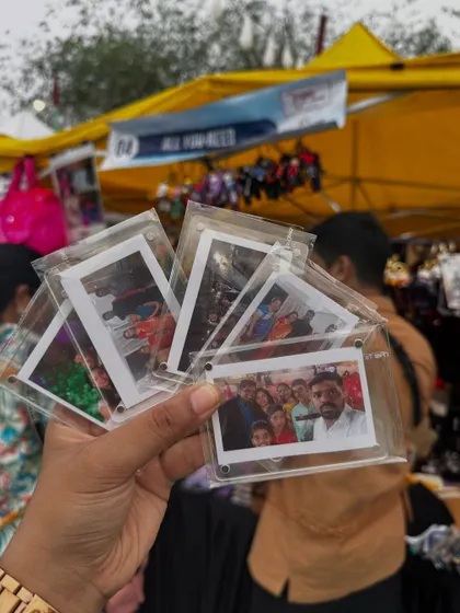 A collection of Polaroid magnets made for customers at a live exhibition.
